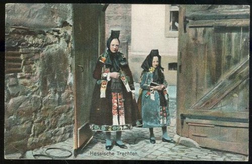 TWO YOUNG GIRLS IN TRADITIONAL HESSIAN COSTUMES