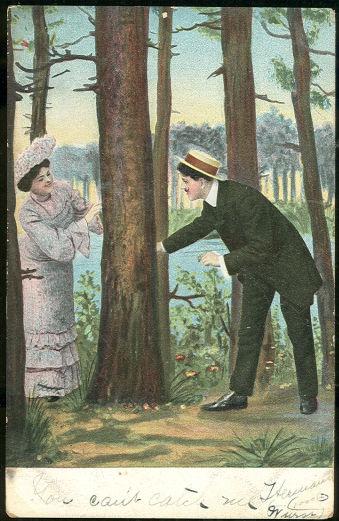 COURTING COUPLE PLAYING IN THE WOODS