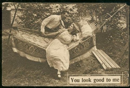 COURTING COUPLE IN HAMMOCK