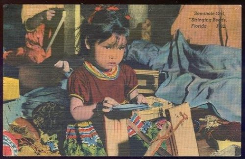 SEMINOLE GIRL STRINGING BEADS, FLORIDA