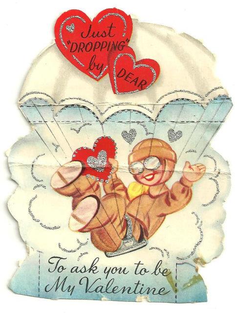 VINTAGE VALENTINE OF PARACHUTING BOY TRIMMED IN SILVER GLITTER