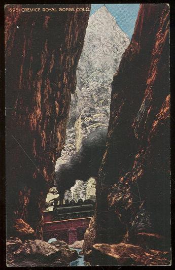 TRAIN THROUGH CREVICE ROYAL GORGE, COLORADO