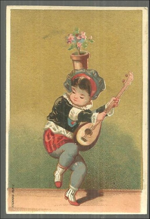VICTORIAN CARD WITH DANCING BOY WITH INSTRUMENT AND FLOWER POT ON HEAD