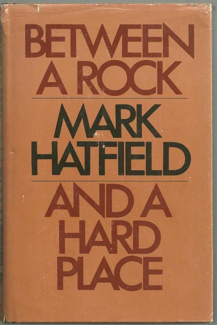 BETWEEN A ROCK AND A HARD PLACE