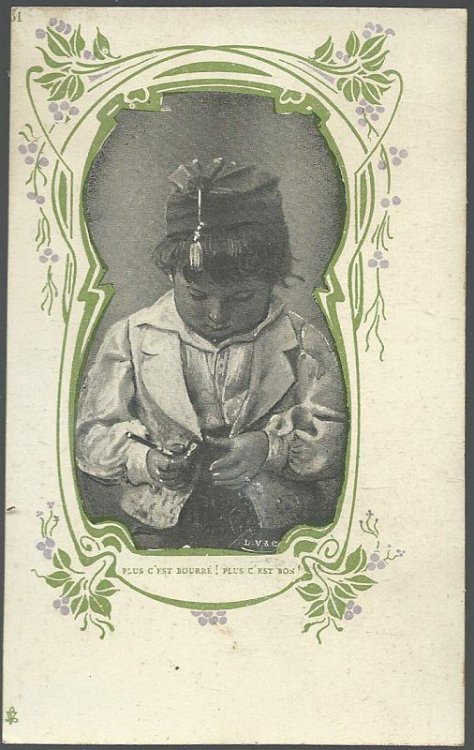 UNDIVIDED POSTCARD OF YOUNG FRENCH BOY FILLING A PIPE