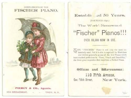 VICTORIAN TRADE CARD FOR FISCHER PIANO WITH TWO GIRLS UNDER UMBRELLA IN THE SNOW