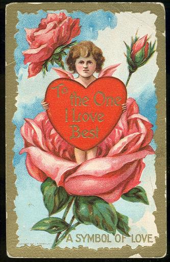 VALENTINE POSTCARD CUPID HOLDING HEART TO THE ONE I LOVE BEST