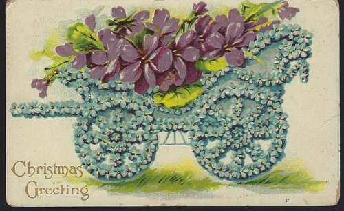 CHRISTMAS GREETINGS POSTCARD WITH FLORAL CART FILLED VIOLETS