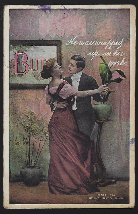 POSTCARD OF DANCING COUPLE, WRAPPED UP IN HIS WORK