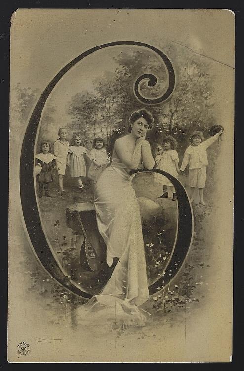 POSTCARD OF LOVELY LADY RESTING ON INITIAL C SURROUNDED BY CHILDREN