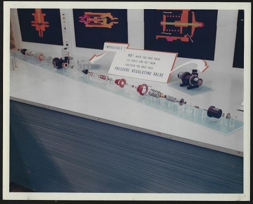 ORIGINAL COLOR PHOTOGRAPH OF DISPLAY OF 203 PARTS OF A PRESSURE REGULATING VALVE, MARSHALL SPACE FLIGHT CENTER, HUNTSVILLE, ALABAMA