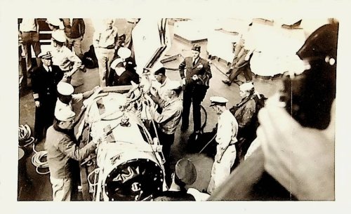 U.S. Navy transfer of Marine PFC Herbert E. Watts, polio victim in iron lung, from the hospital ship USS Repose docked in Tsingtao, China