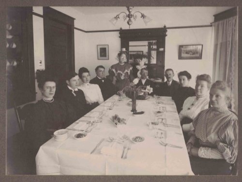 B&W Family Photograph - around a dining table; 7x9-3/4