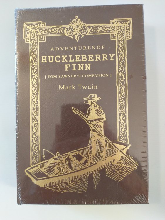 THE ADVENTURES OF HUCKLEBERRY FINN