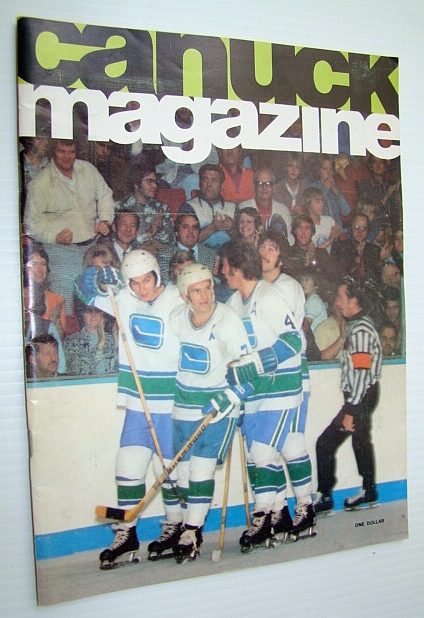 Image for Vancouver Canuck Magazine, October 25, 1974 - Colour Cover Photo of Canuck Goal Celebration with Barry Wilkins and Three Teammates Vancouver Canuck Magazine, October 25, 1974 - Colour Cover Photo of Canuck Goal Celebration with Barry Wilkins and Three Teammates