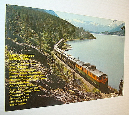 Lake Bennett Lunch Stop: Picture Post Card (PPC) Colour Photo of a White Pass & Yukon Railway Train at Lake Bennett